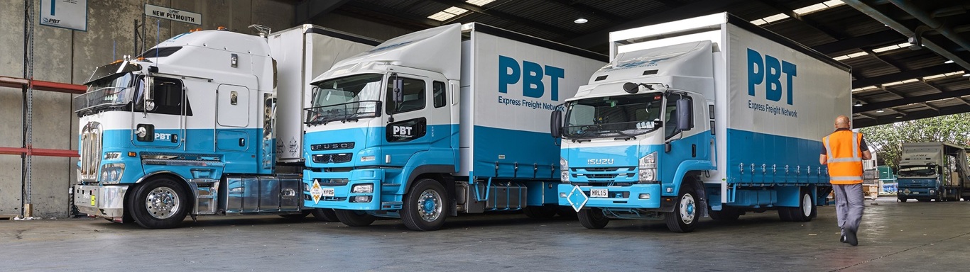 PBT trucks in their warehouse. 