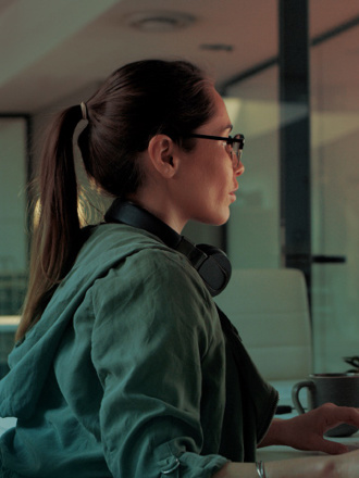 Shot of a young designer working on a computer in an office.