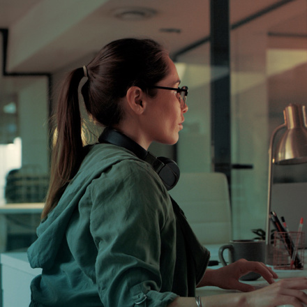 Shot of a young designer working on a computer in an office.