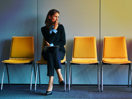 Stressful young woman waiting for job interview.