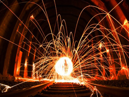 Abstract image of an explosion in a mine shaft.