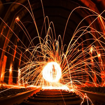 Abstract image of an explosion in a mine shaft.