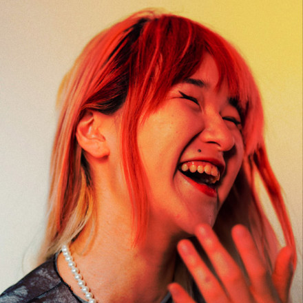 Red headed woman laughing