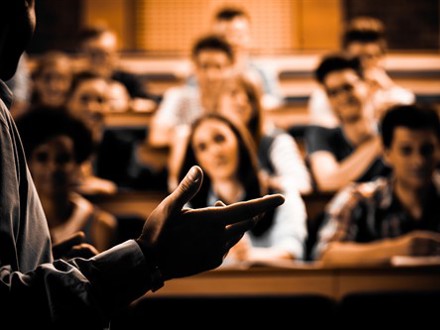 Lecturer teaching a class. 