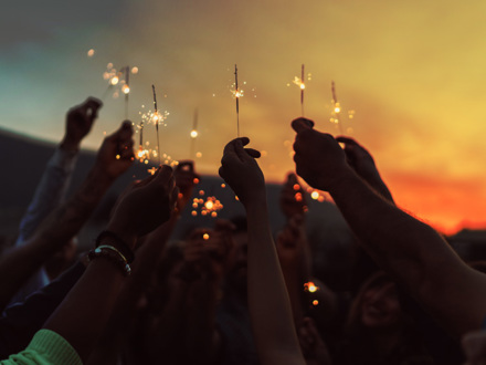 Friends celebrating New Year on the rooftop