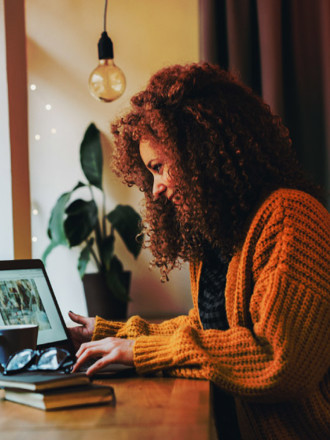 Young woman working on a laptop.