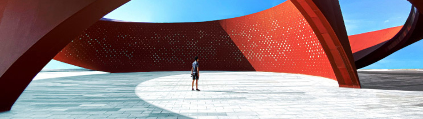 A person standing in a red curved abstract architectural space, 3D rendering.