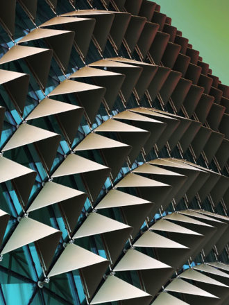 Abstract close-up view of modern aluminium ventilated facade of triangles.