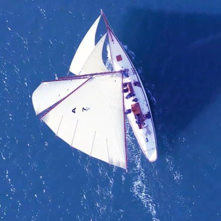 Yacht top view on water