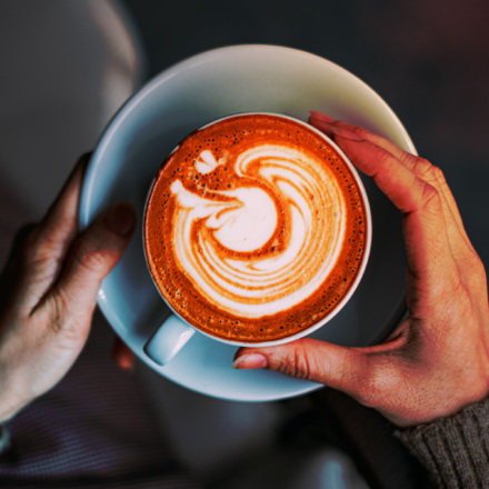 Flat Lay Woman Hand Holding Coffee Latte