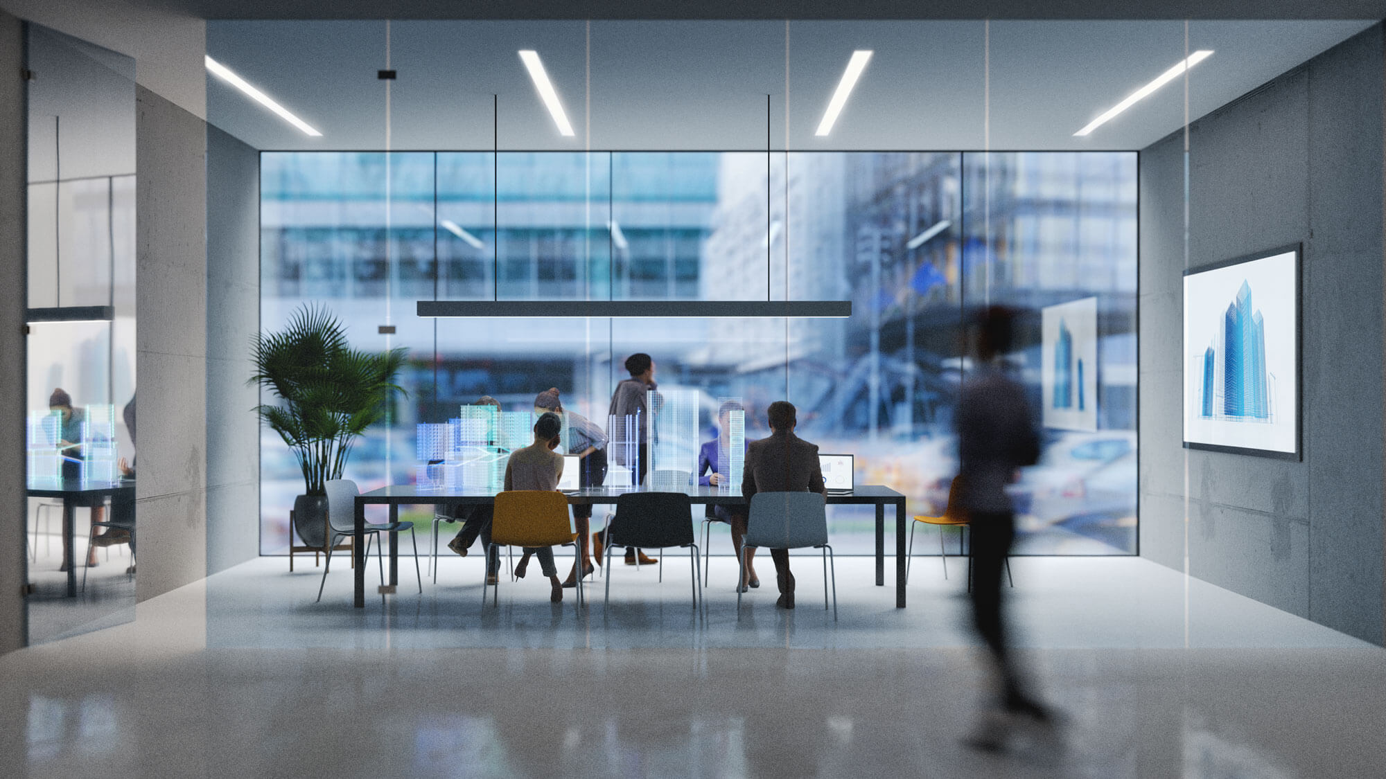 Modern office setting with people sitting at a conference table and one person standing. A large window showcases a blurred cityscape. Digital screens displaying graphs are on the walls, and a potted plant decorates the room. Both men and women are present.