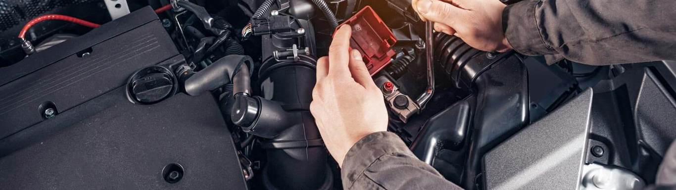 Auto Repair Shop or Auto Service. Replacing a car battery. Disconnecting the car battery terminal. Scheduled vehicle inspection.