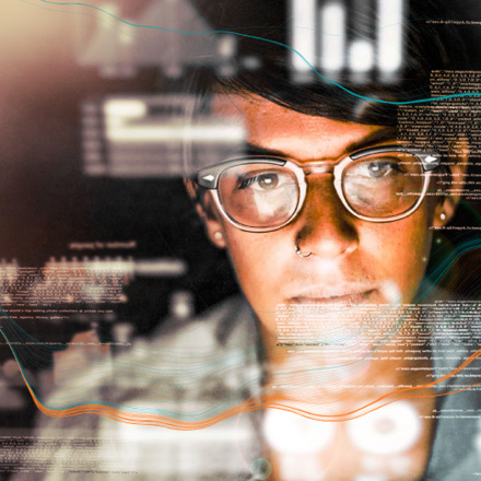 A person wearing glasses looks at a computer screen displaying overlapping lines of code. The image suggests focus and concentration, with a blend of digital and human elements.