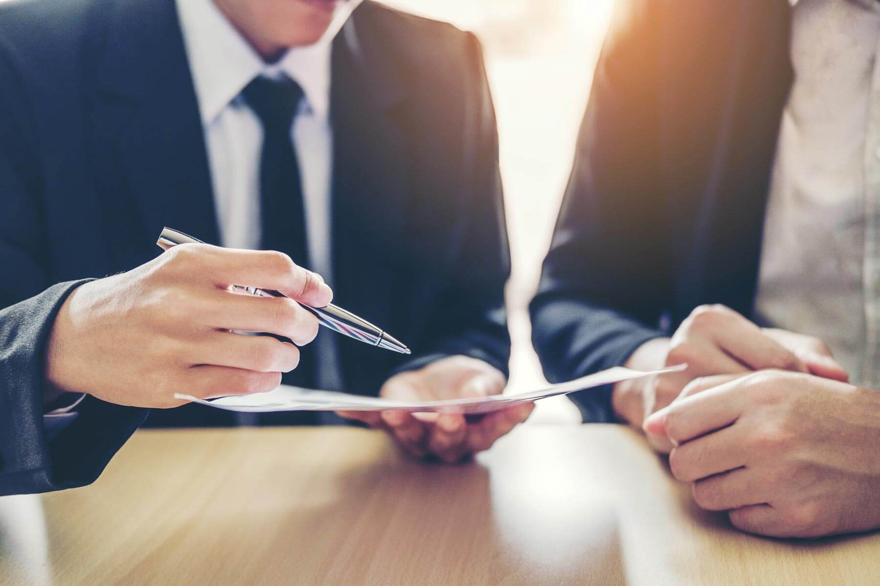 Business people Meeting negotiating a contract between two colleagues.